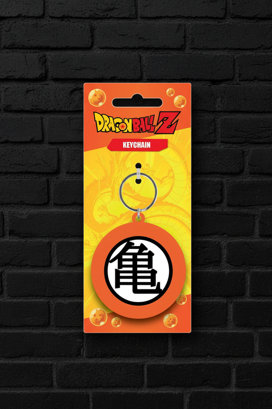 Dragon Ball Z Kame Symbol Rubber Keychain on black brick background